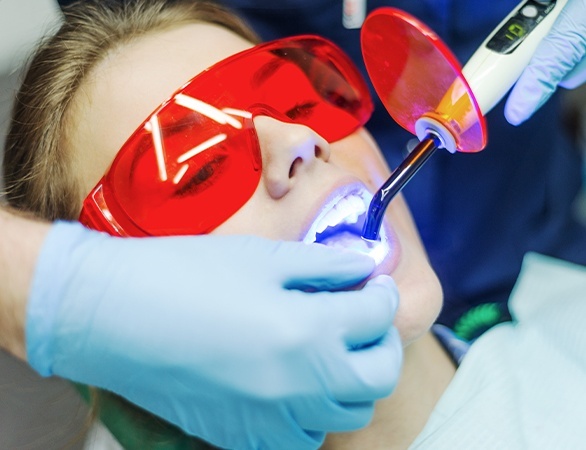 Patient receiving cosmetic dental bonding treatment