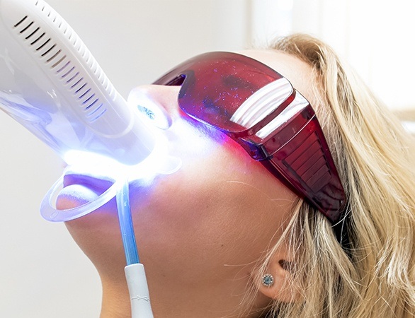 Patient receiving in-office teeth whitening