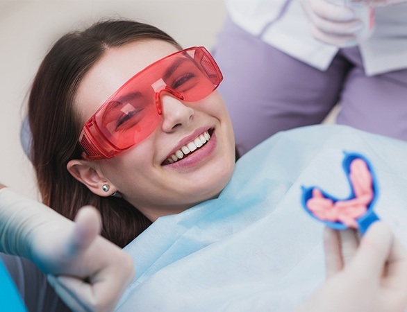 Young girl getting ready for a fluoride treatment