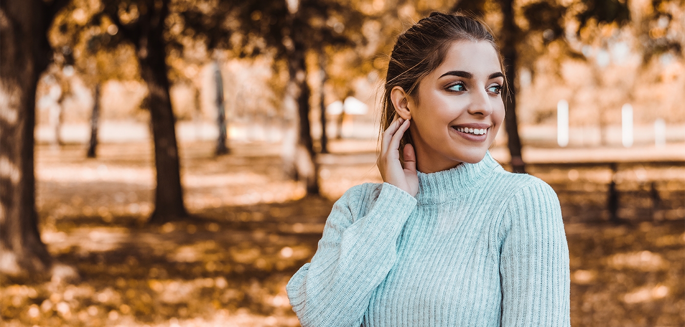 Woman sharing flawless smile thanks to cosmetic dentistry