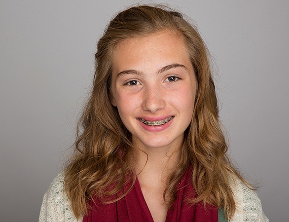 Preteen girl with orthodontics