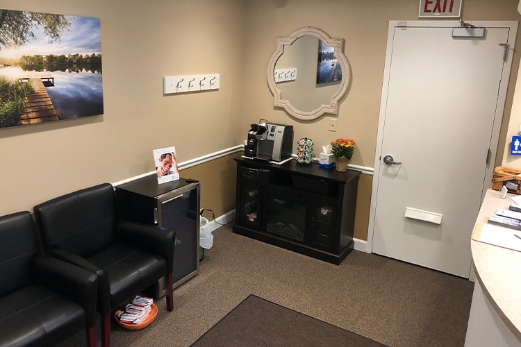 Complimentary beverage bar in dental office reception area