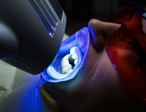 Patient receiving in-office teeth whitening