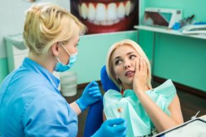 Patient visiting Aurora dentist for dental emergency